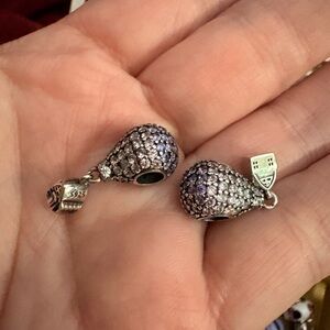 Two purple rhinestone s925 hot air balloon charms.